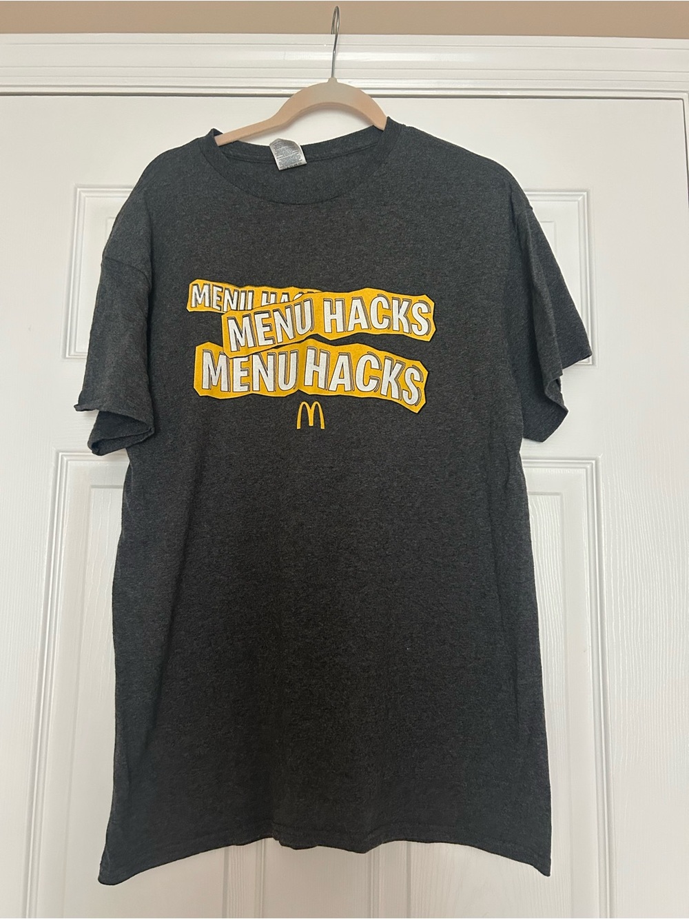 Delta Men’s Charcoal Graphic Tee with Yellow Print